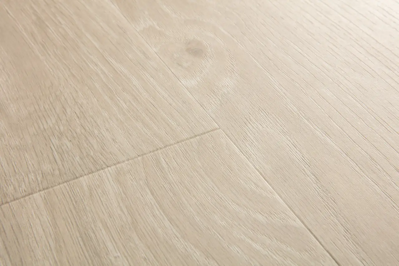Close-up van de structuur van Quick-Step Bloom Zeebries beige eik