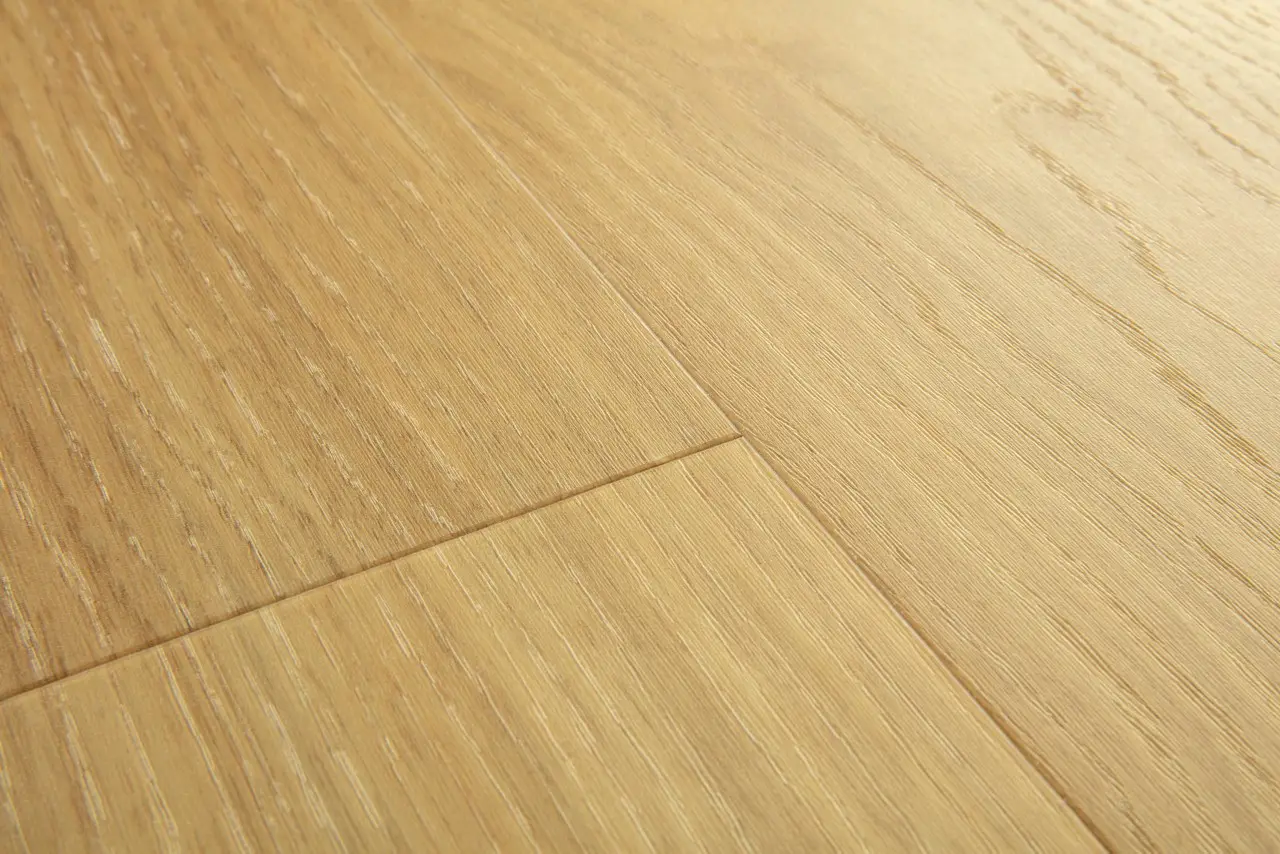 Close-up van de structuur van Quick-Step Bloom Pure honing eik
