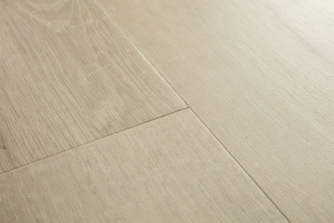 Close-up van de structuur van Quick-Step Bloom Katoenbeige eik