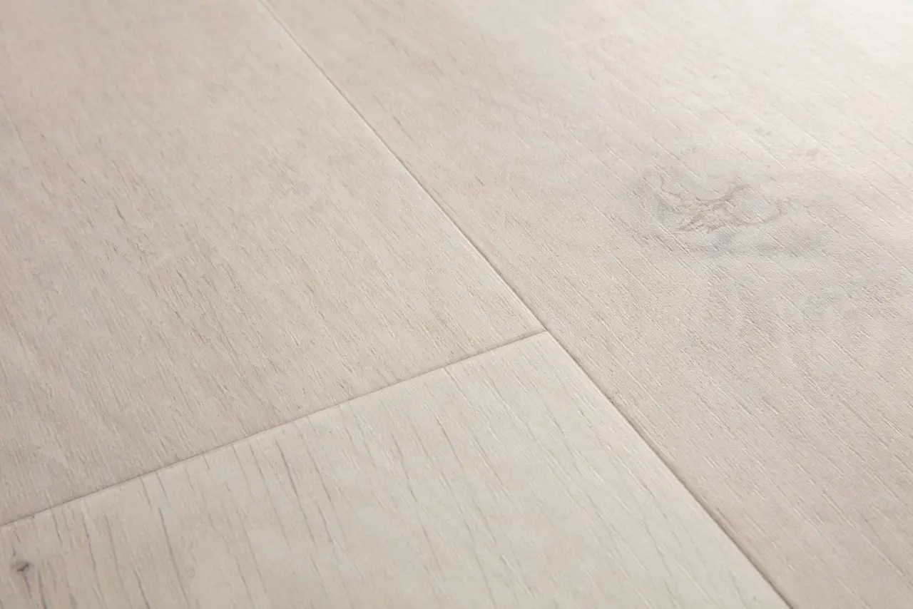 Close-up van de structuur van Quick-Step Bloom Katoenwitte eik blush