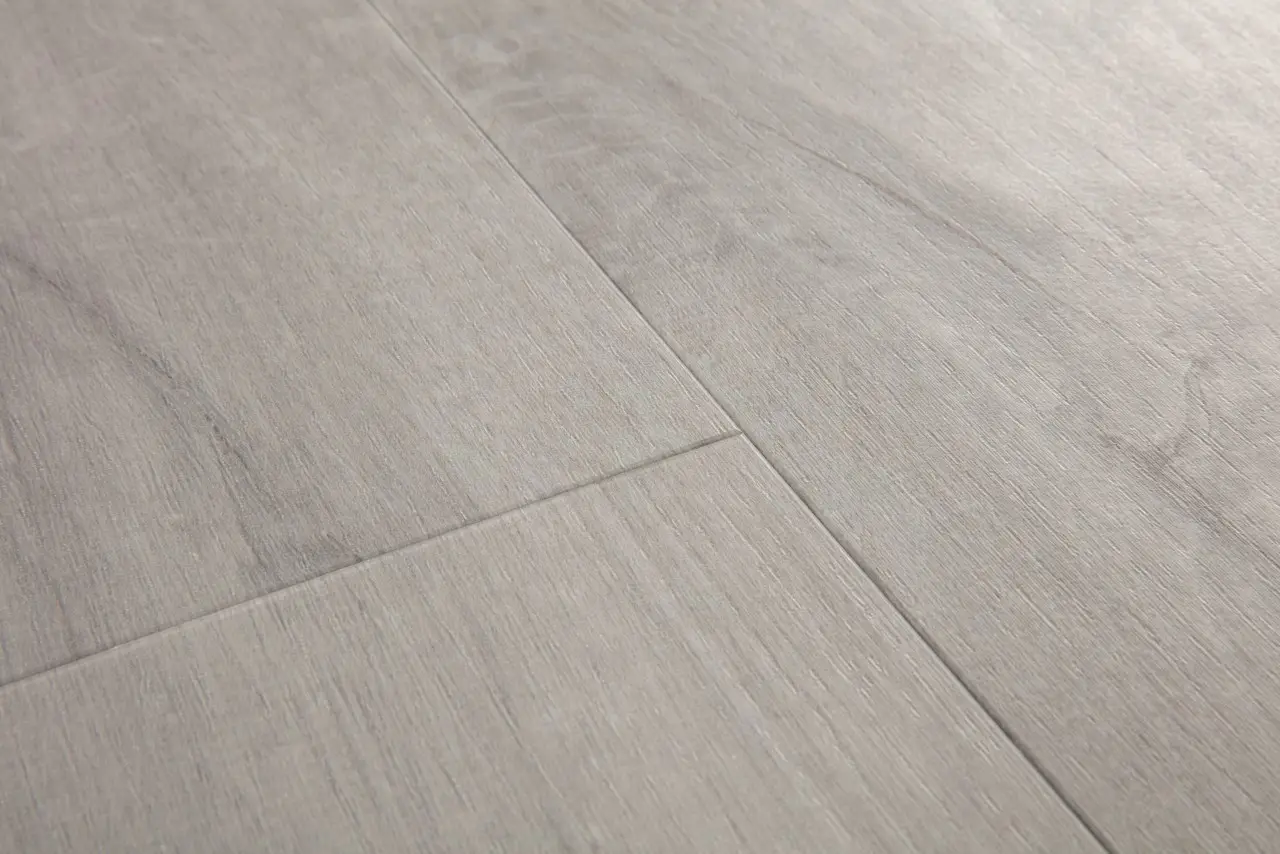 Close-up van de structuur van Quick-Step Bloom Katoen koudgrijze eik