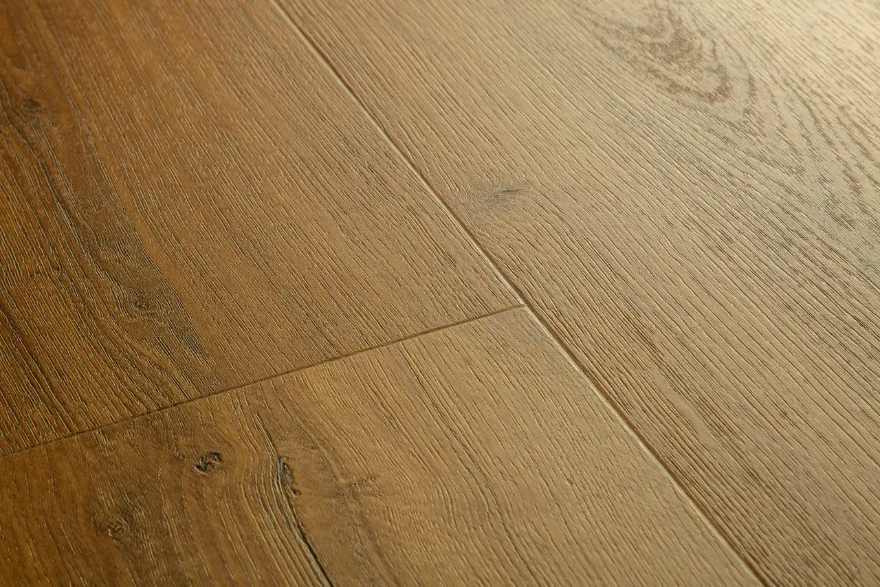 Close-up van de structuur van Quick-Step Bloom Botanische karamel eik