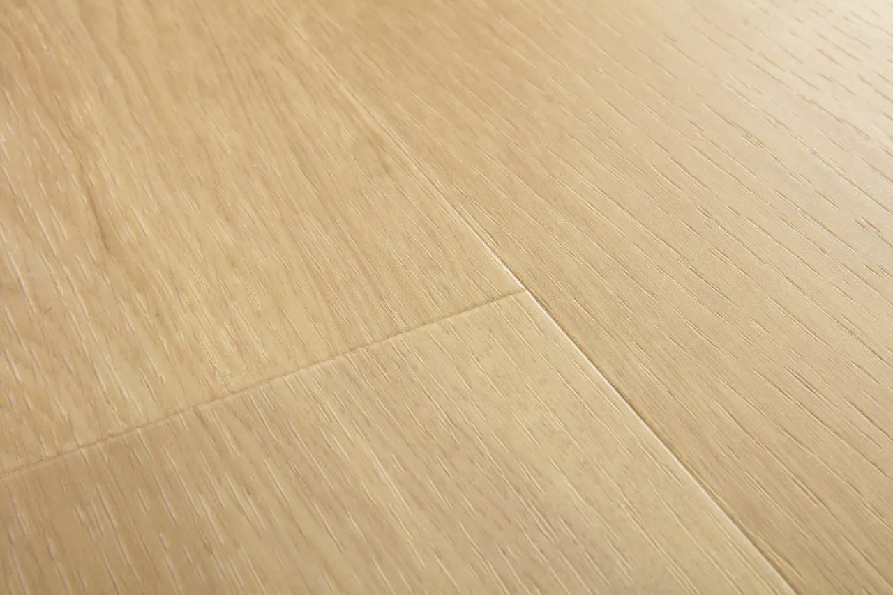 Close-up van de structuur van Quick-Step Blos Drijvende beige eik