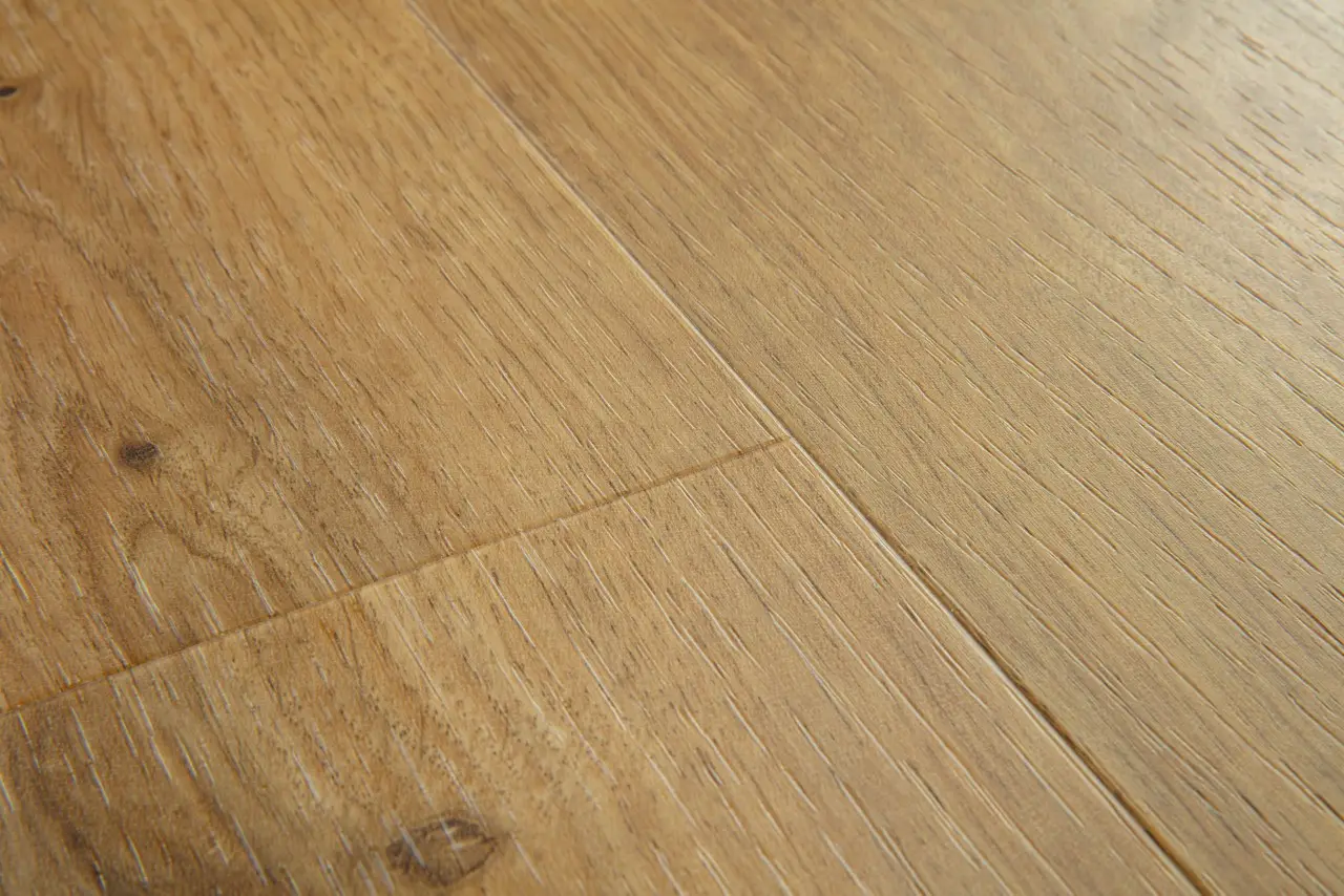 Close-up van de structuur van Quick-Step Blos base Cottage naturelle eik