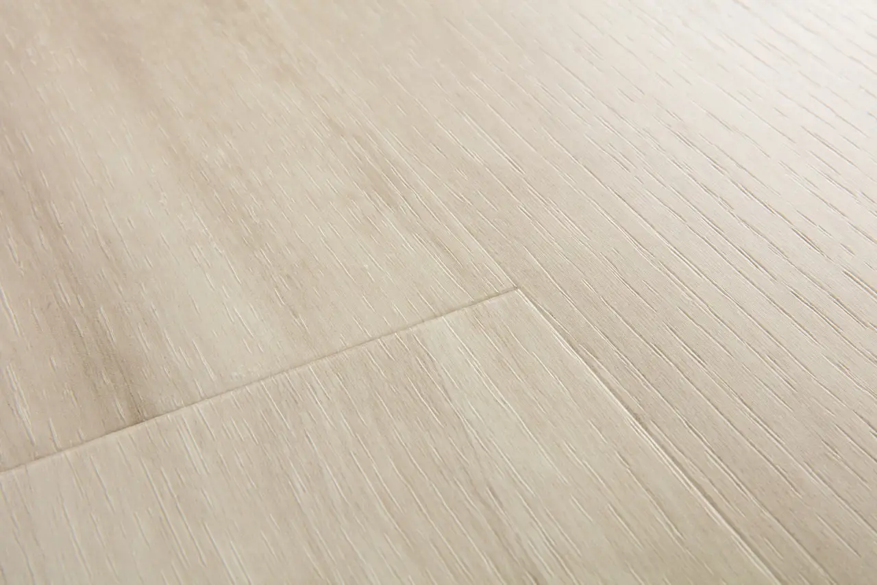 Close-up van de structuur van Quick-Step Blos Canyon beige eik