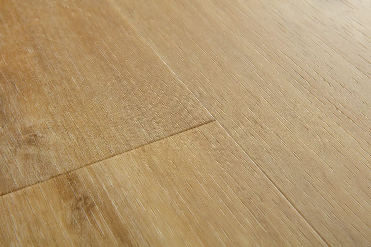 Close-up van de structuur van Quick-Step Blos base Canyon naturelle eik