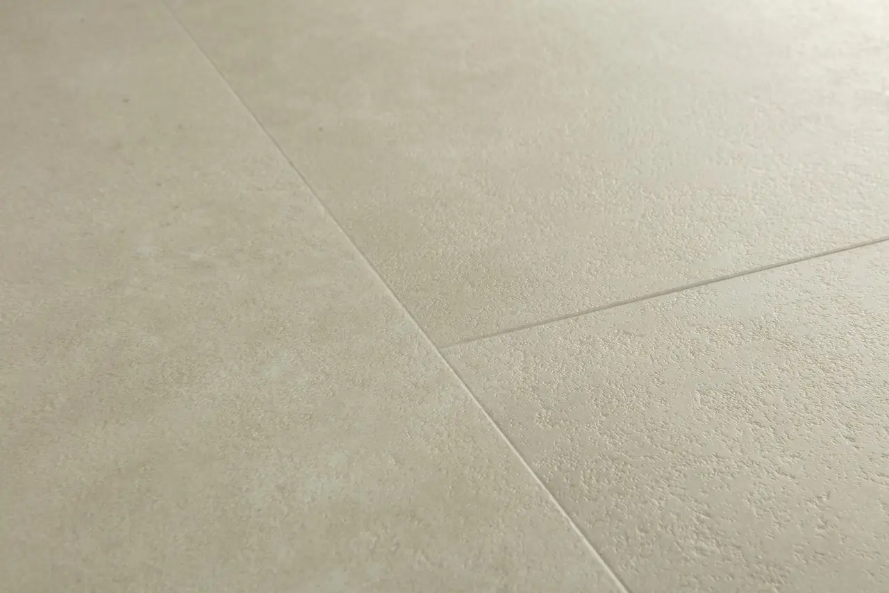 Close-up van de structuur van Quick-Step Blush Cement warm beige