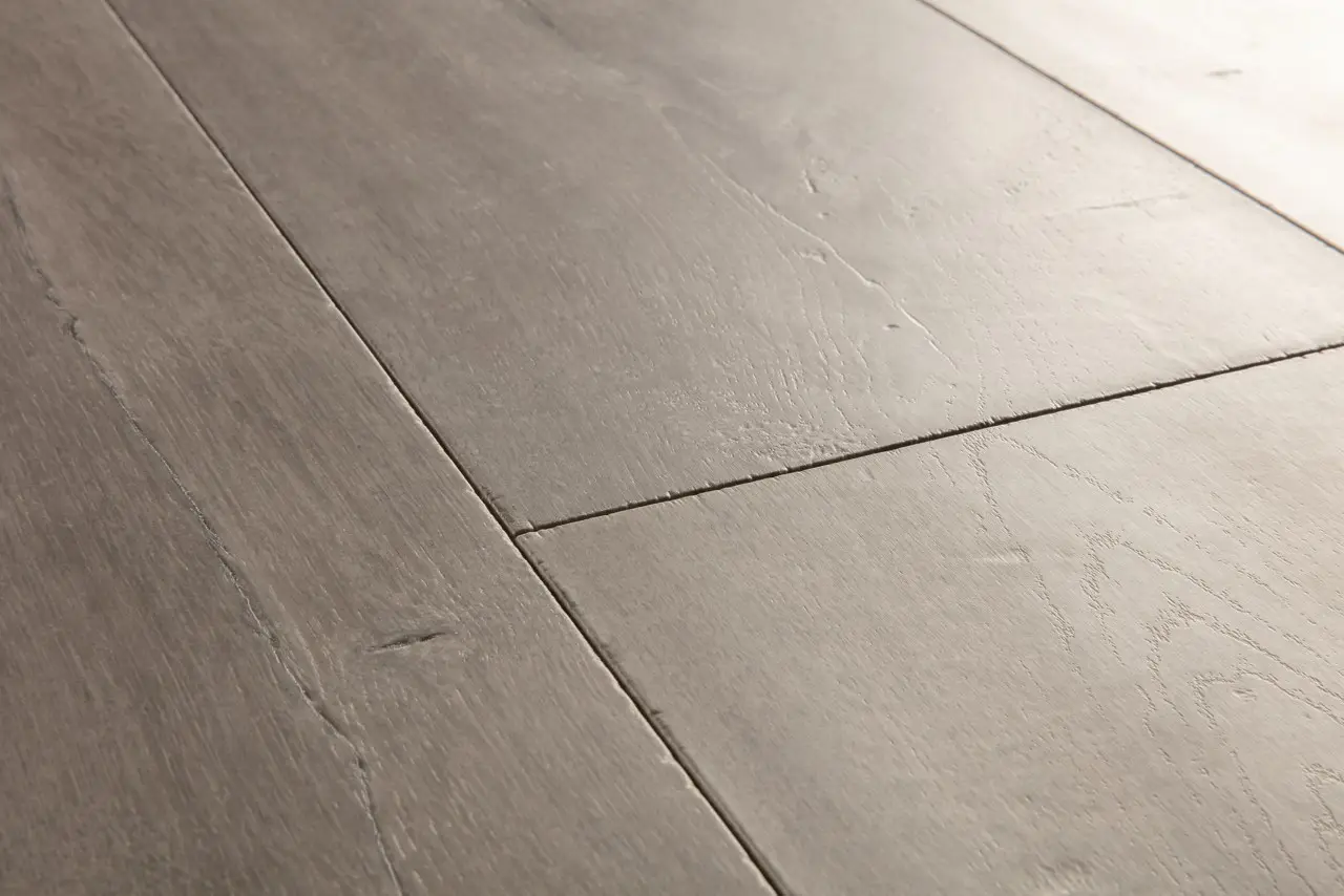 Close-up van de structuur van Quick-Step Capture Patina grijze eik