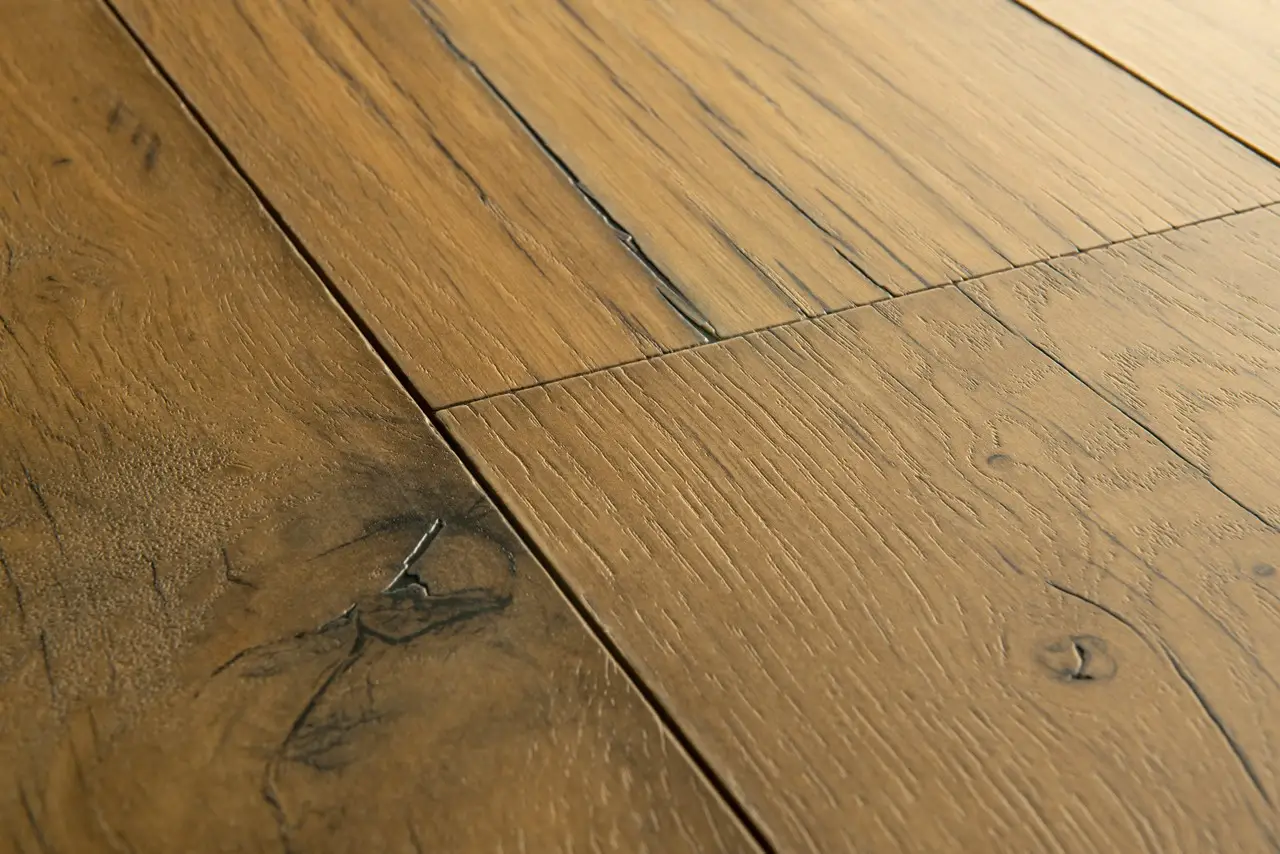 Close-up van de structuur van Quick-Step Capture Gebarsten naturelle eik