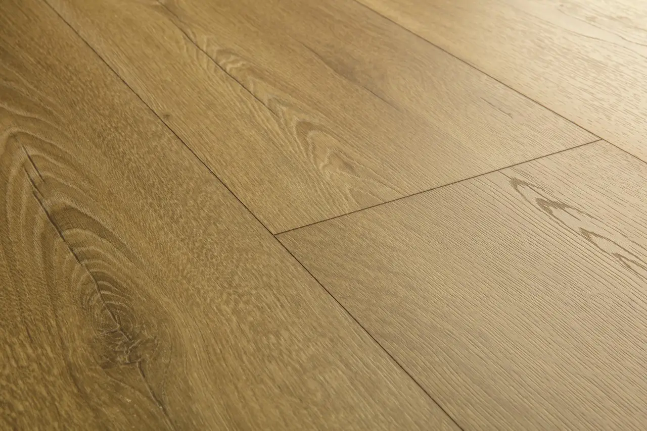 Close-up van de structuur van Quick-Step Classic Honingbruine eik