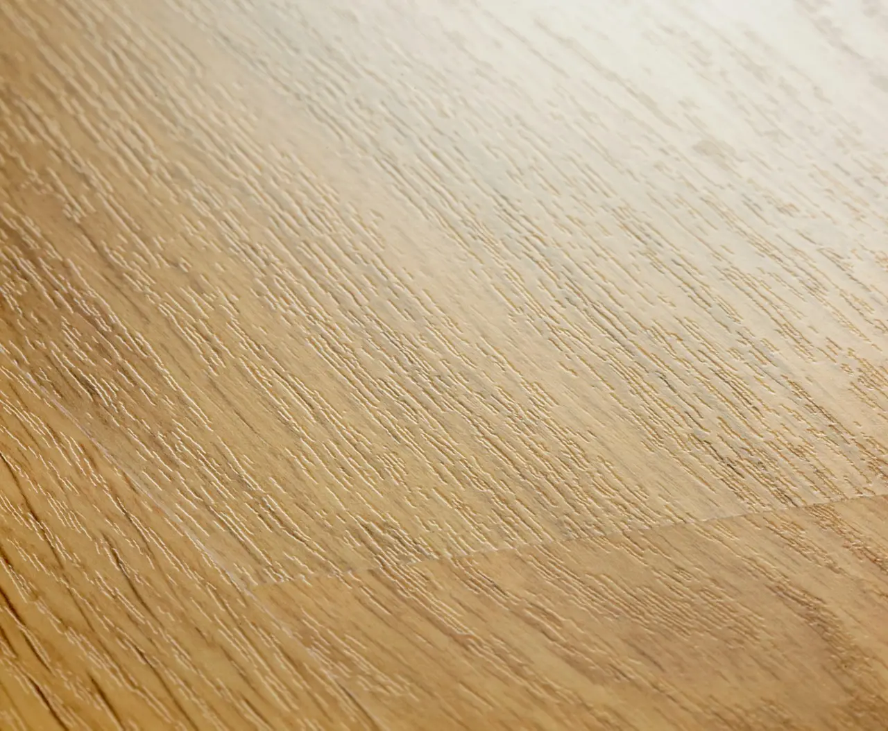 Close-up van de structuur van Quick-Step Eligna Geverniste naturelle eik