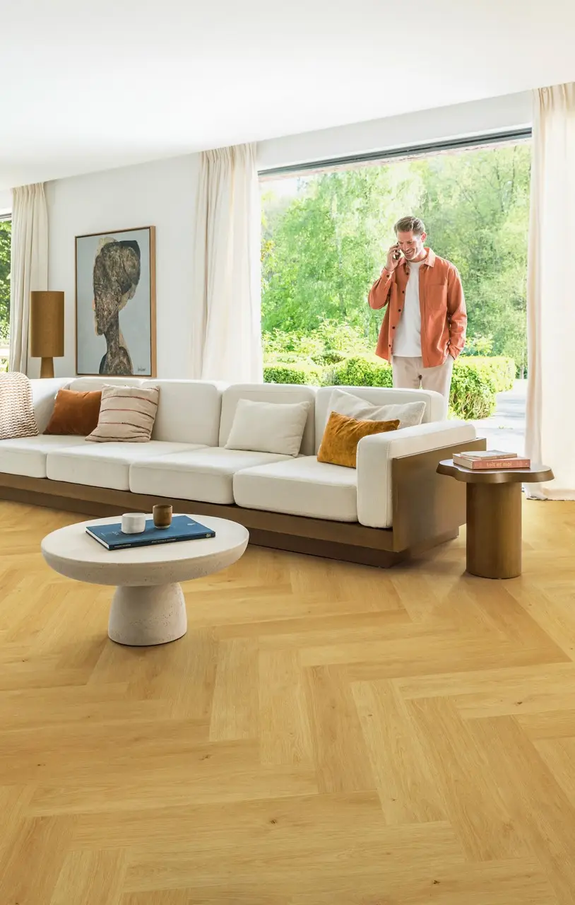 Ruimte met de laminaatvloer Quick-Step Impressive Design Komijn eik
