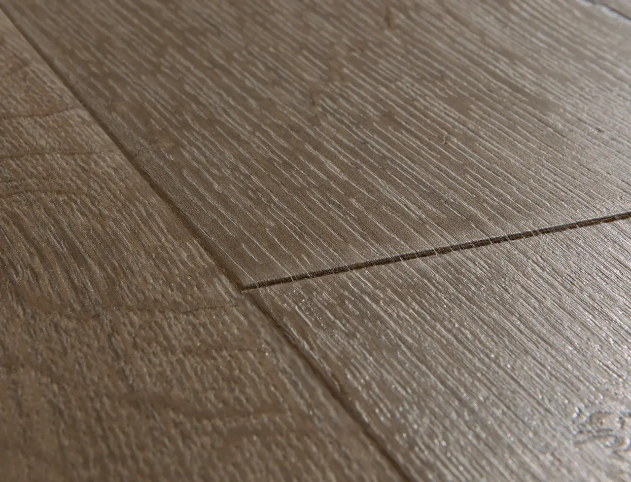 Close-up van de structuur van Quick-Step Impressive Klassieke bruine eik