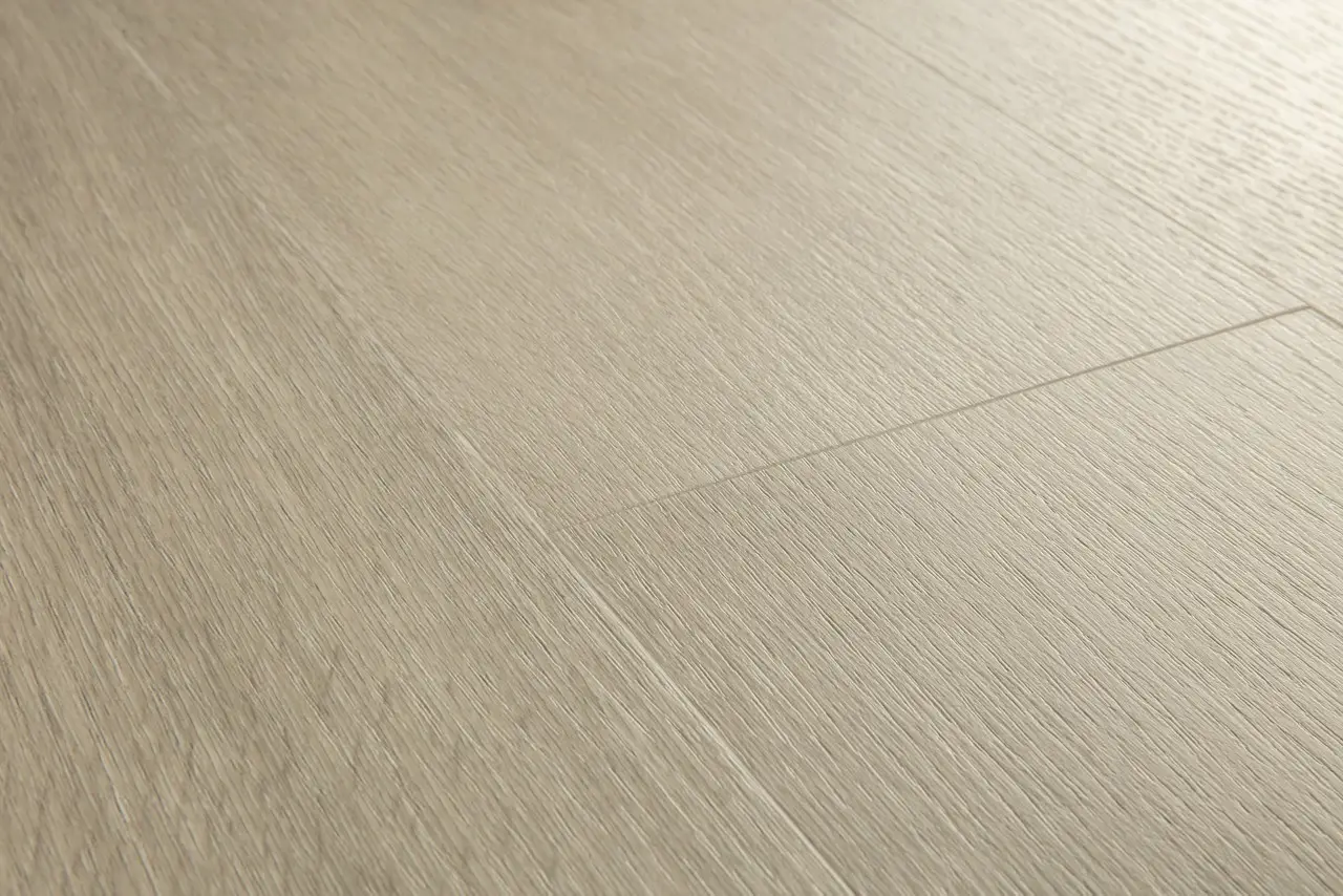 Close-up van de structuur van Quick-Step Liv Satijn eik taupe grijs