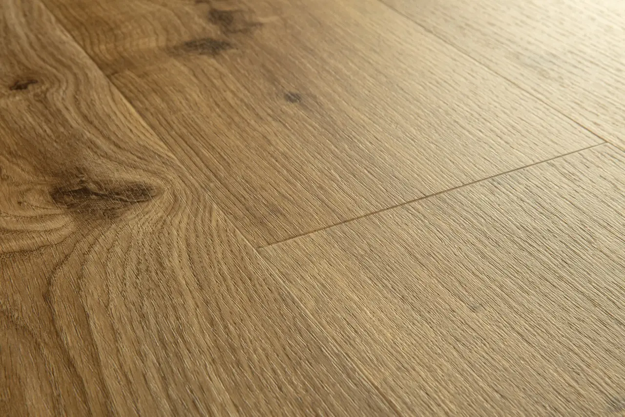 Close-up van de structuur van Quick-Step Liv Landelijke charme medium bruin
