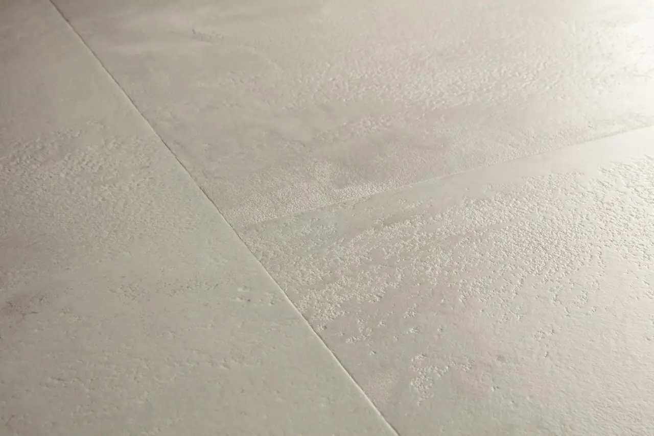 Close-up van de structuur van Quick-Step Muse Grijs beton