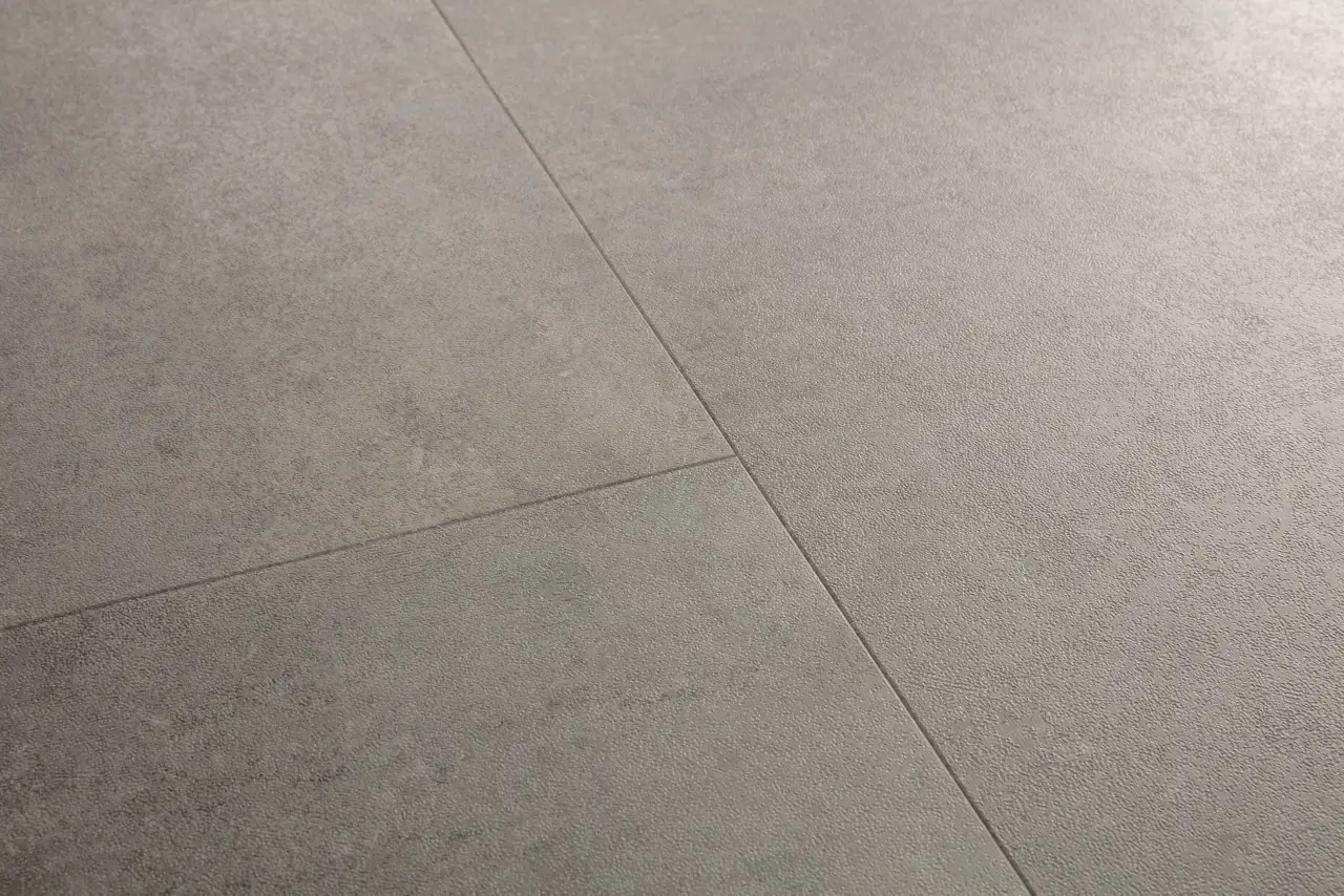 Close-up van de structuur van Quick-Step Oro base Betonrots