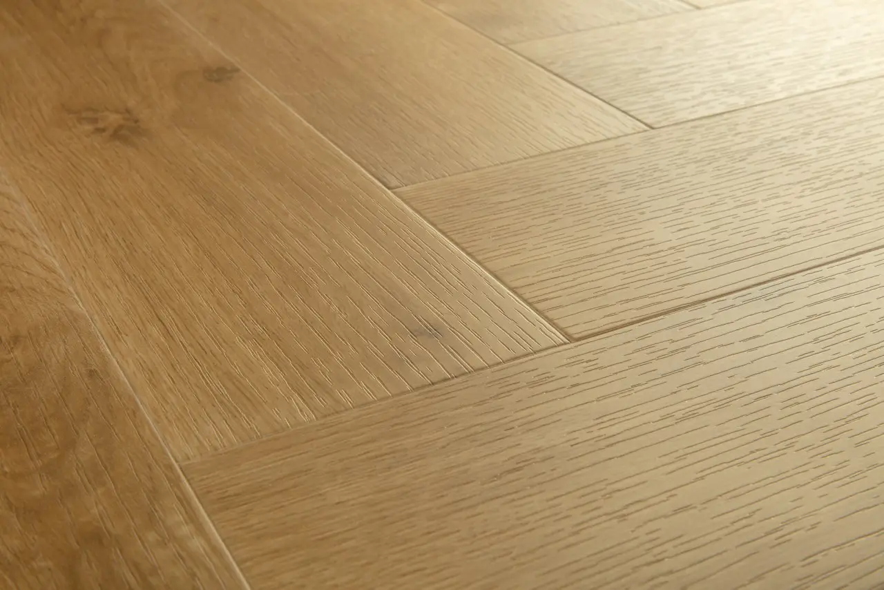 Close-up van de structuur van Quick-Step Pristine Ocean bliss warme honing