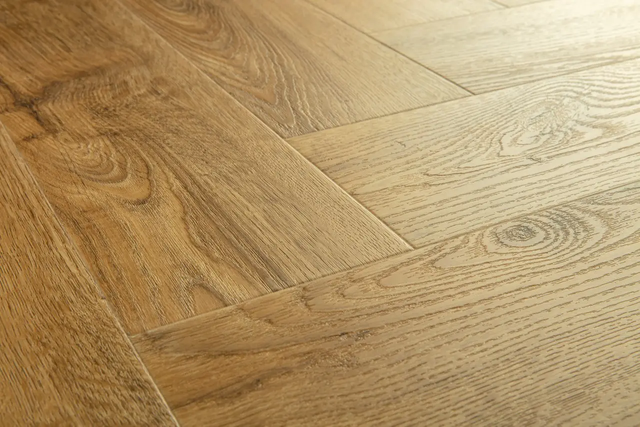 Close-up van de structuur van Quick-Step Pristine Herfst eik honing